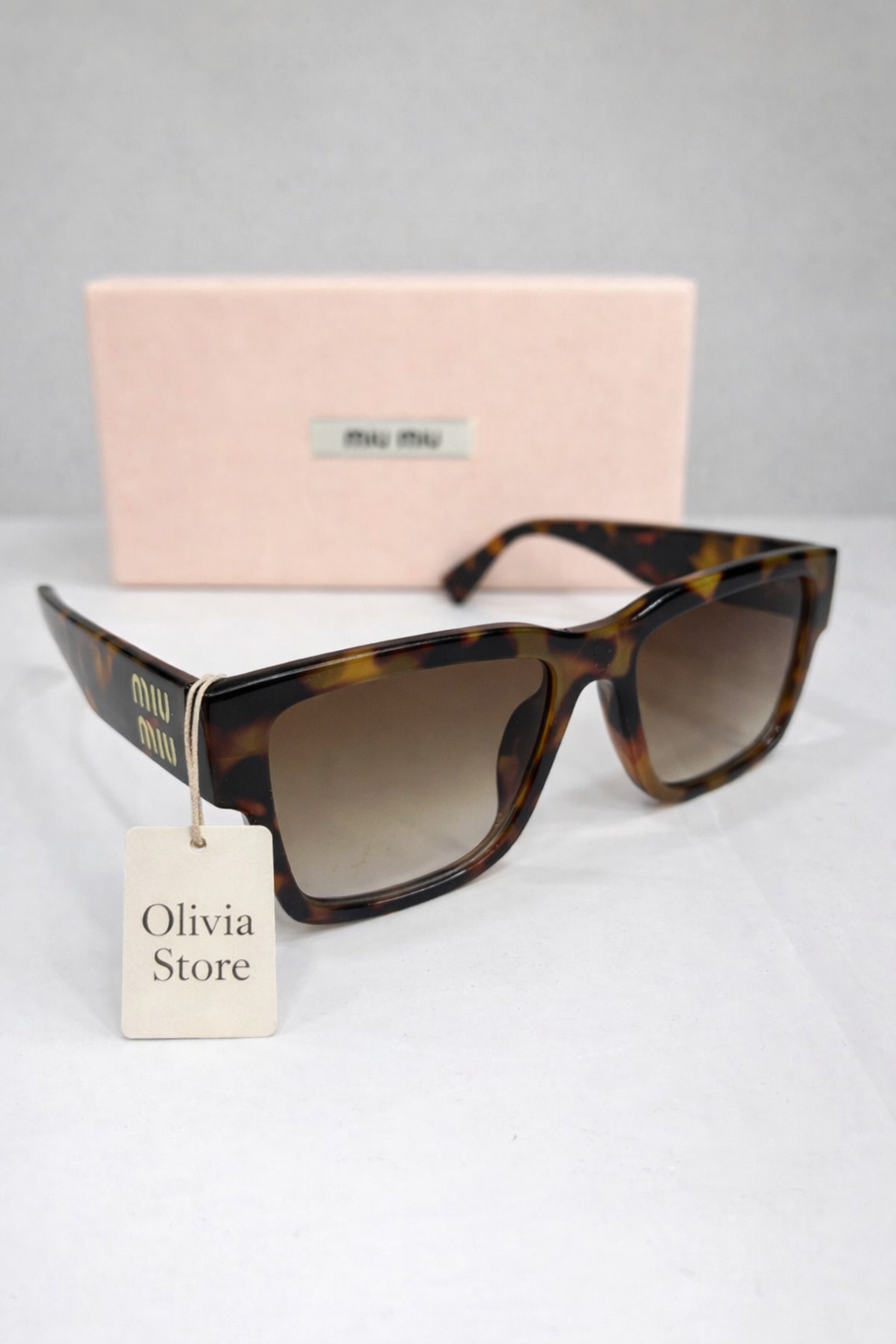 Miu Miu Lentes 19